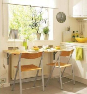 Идеальный выбор: как подобрать стол для оптимального использования пространства на маленькой кухне